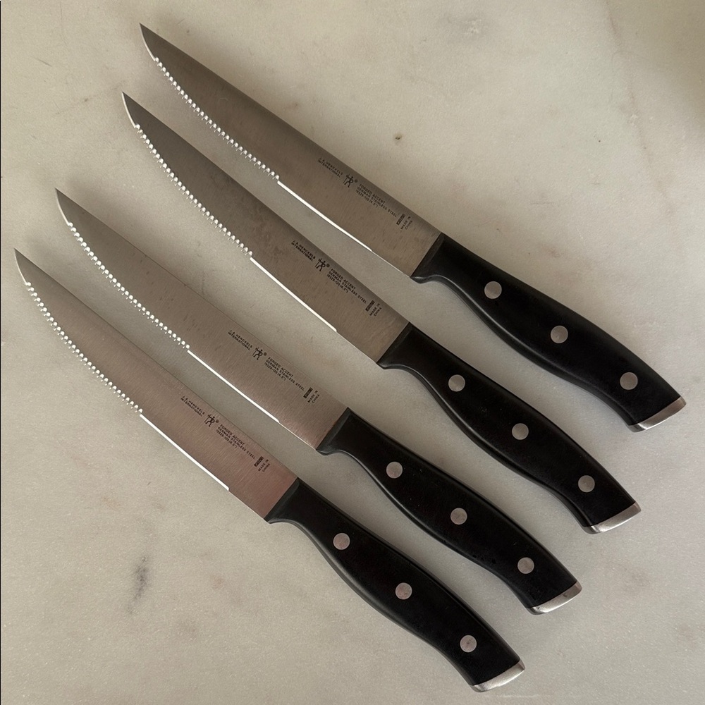 Set of Four J.A. Henckles Stainless Steel Steak Knives